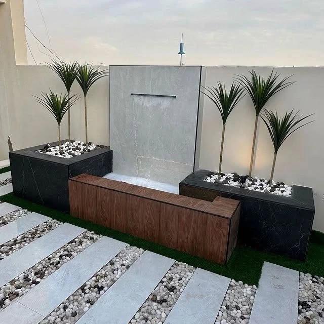 تصميم شلالات ونوافير تضيف الرفاهية لحديقتك